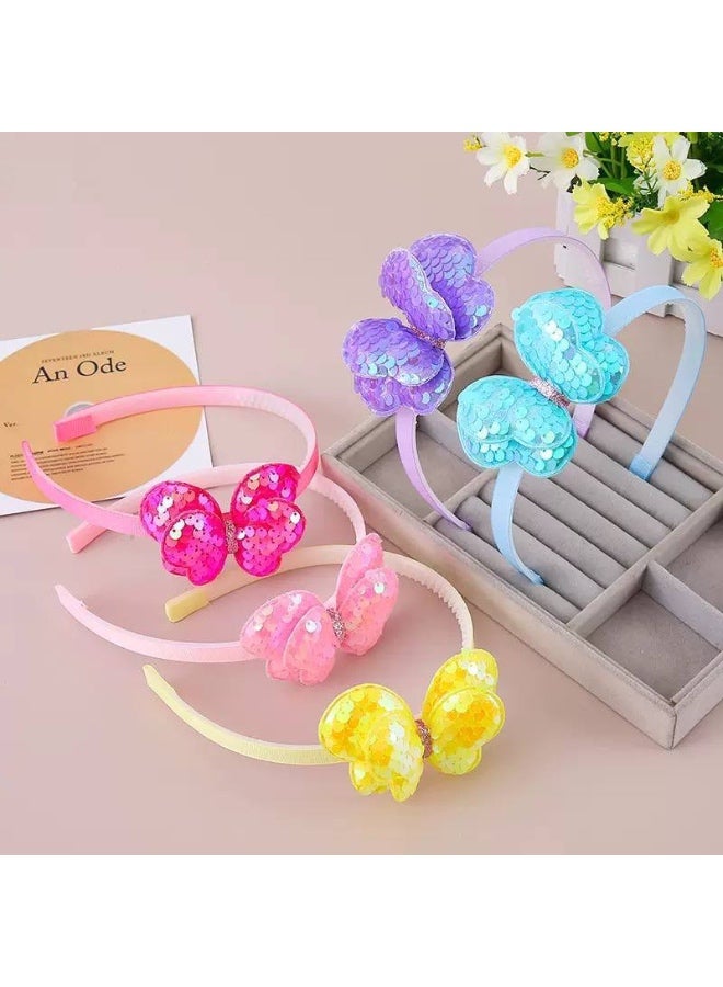 طوق شعر بناتي للأطفال مزين بفراشة لامعة متعددة الألوان، خفيف ومريح على الرأس، مناسب للاستخدام اليومي والمناسبات، ويضيف لمسة مرحة وأنيقة لإطلالة الأطفال. - Image 1